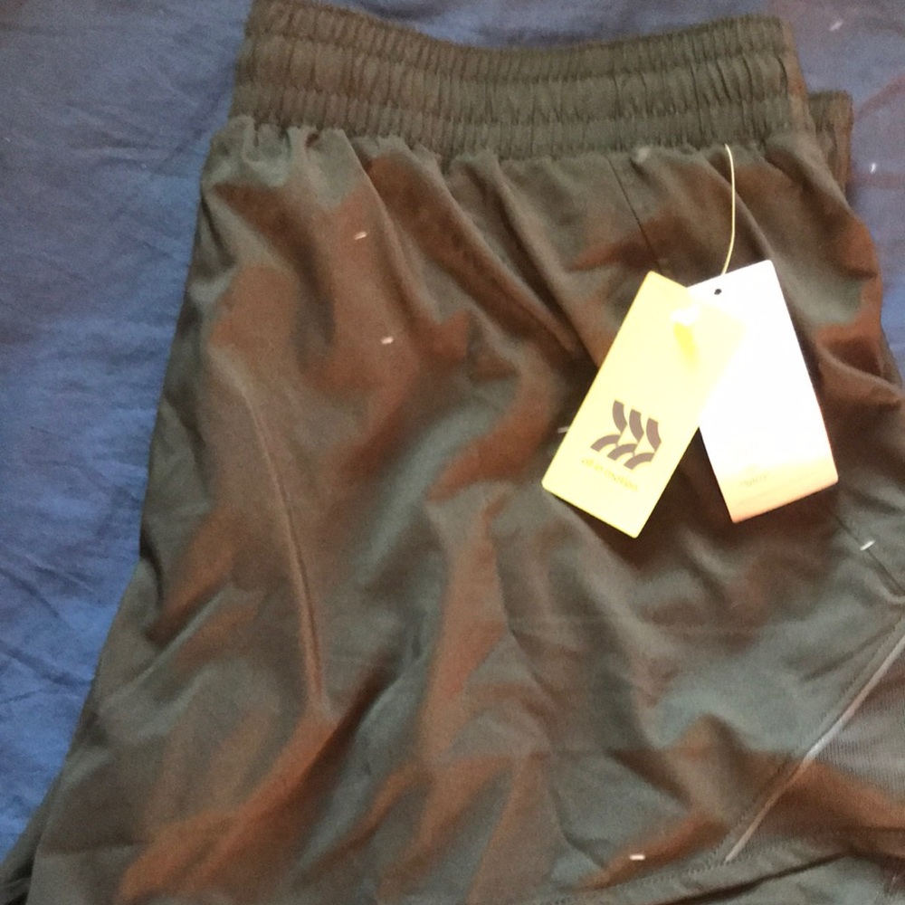 All in motion lined olive green workout shorts NWT